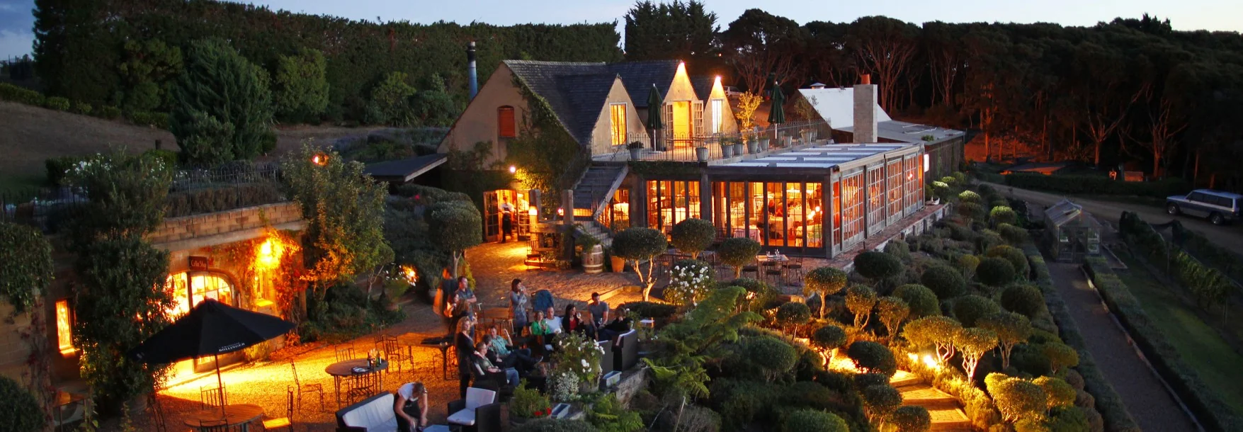 Mudbrick vineyard restaurant on Waiheke Island at dusk